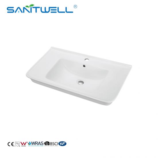 small basin with cabinet