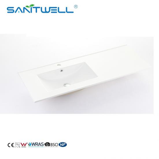 left basin above cabinet