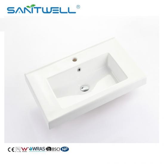 basin above furniture cabinet